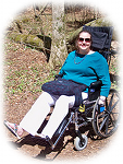 Jodie in wheelchair with large ramp bag