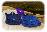 Small, Medium and Large Ramp Bags laid out on rock